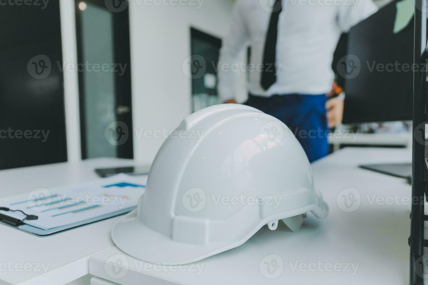 Construction and structure concept of Engineer or architect meeting for project working with partner and engineering tools on model building and blueprint in working site, contract for both companies. photo