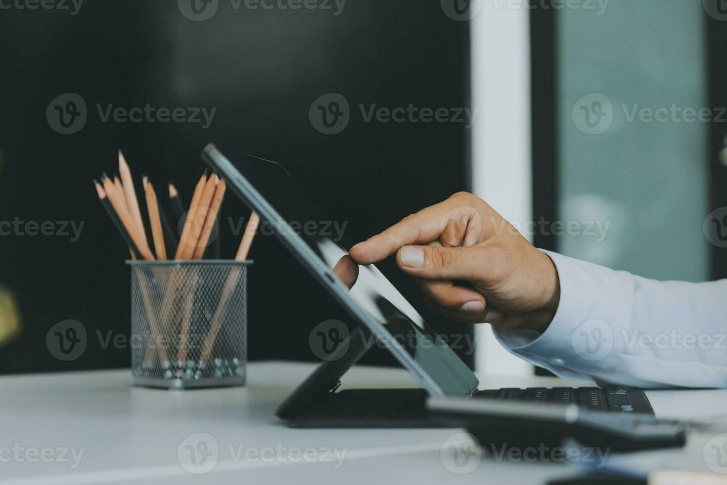Close up of Business team analyzing income charts and graphs with modern laptop computer. Business analysis and strategy concept. photo