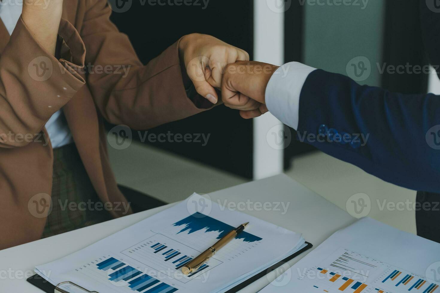 Team of business people working together in the meeting room office, teamwork background charts and graphs banner, double exposure successful teamwork,business planning concept. photo