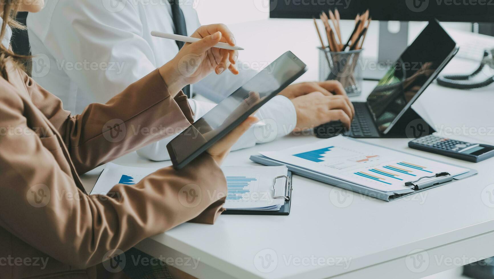 Team of business people working together in the meeting room office, teamwork background charts and graphs banner, double exposure successful teamwork,business planning concept. photo