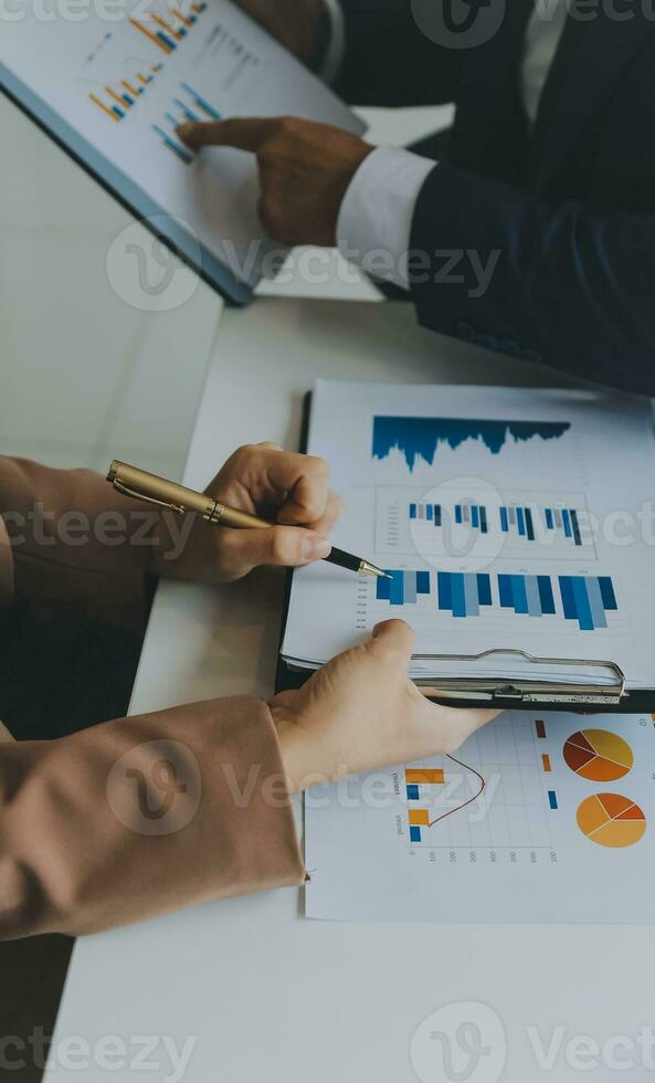 Team of business people working together in the meeting room office, teamwork background charts and graphs banner, double exposure successful teamwork,business planning concept. photo