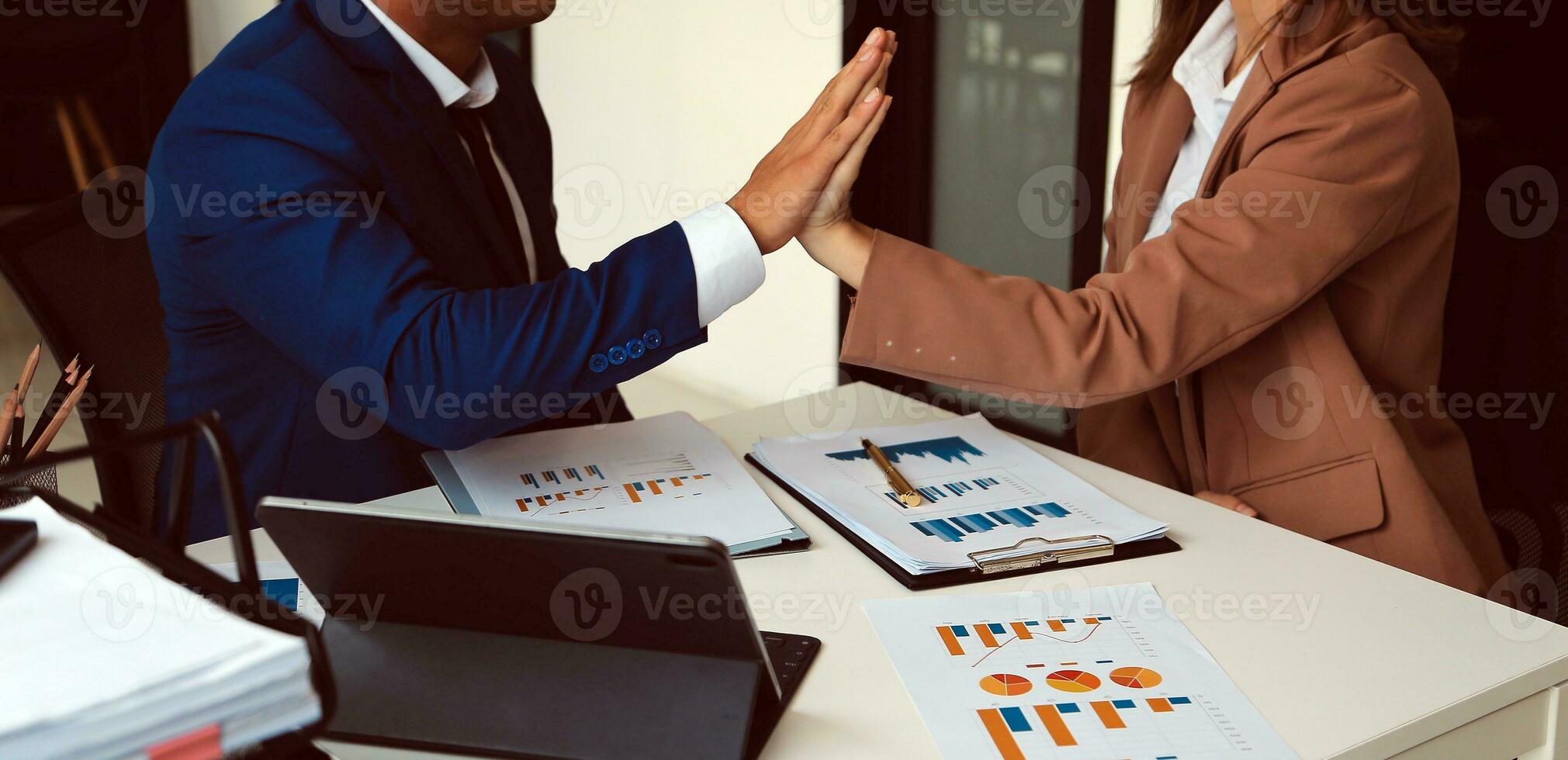 Team of business people working together in the meeting room office, teamwork background charts and graphs banner, double exposure successful teamwork,business planning concept. photo