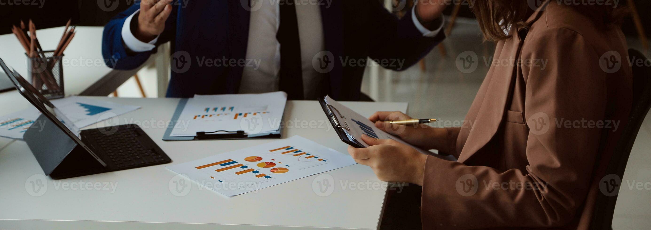 Team of business people working together in the meeting room office, teamwork background charts and graphs banner, double exposure successful teamwork,business planning concept. photo