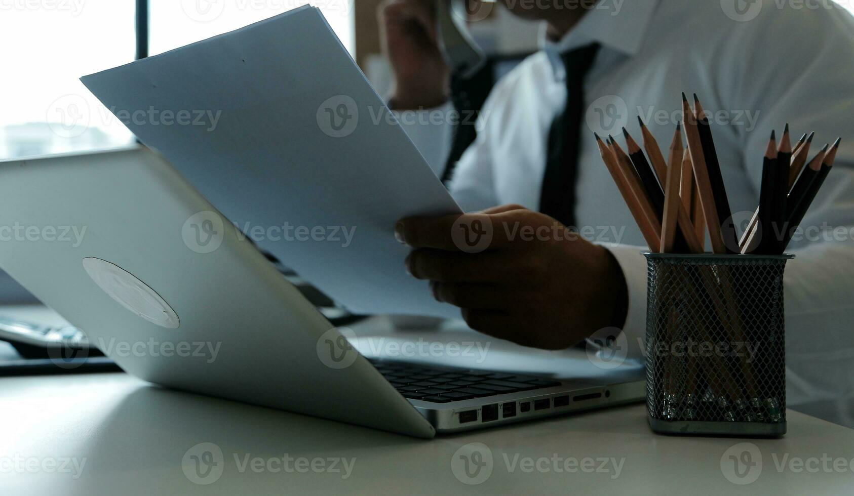 Close up of Business team analyzing income charts and graphs with modern laptop computer. Business analysis and strategy concept. photo