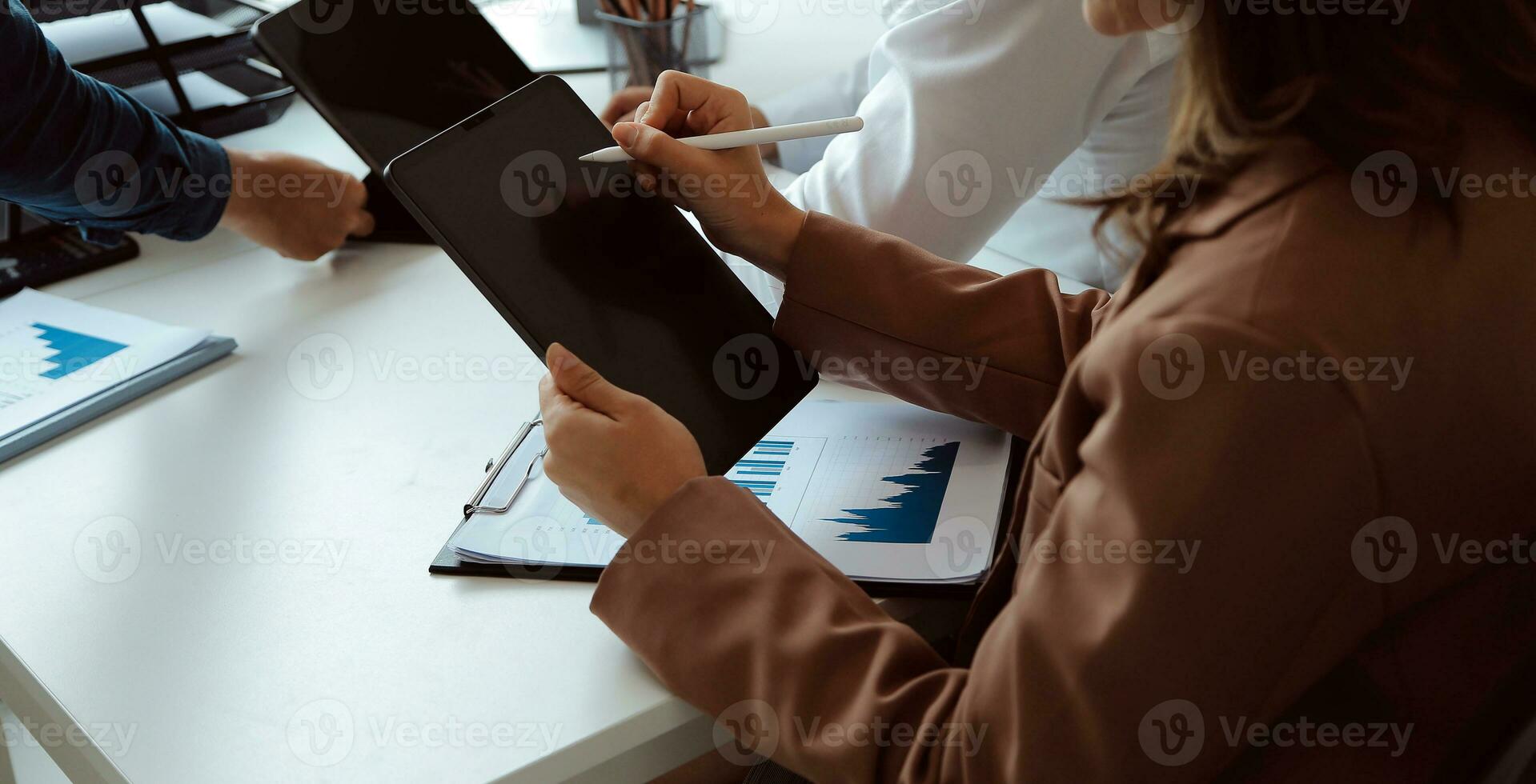 Team of business people working together in the meeting room office, teamwork background charts and graphs banner, double exposure successful teamwork,business planning concept. photo