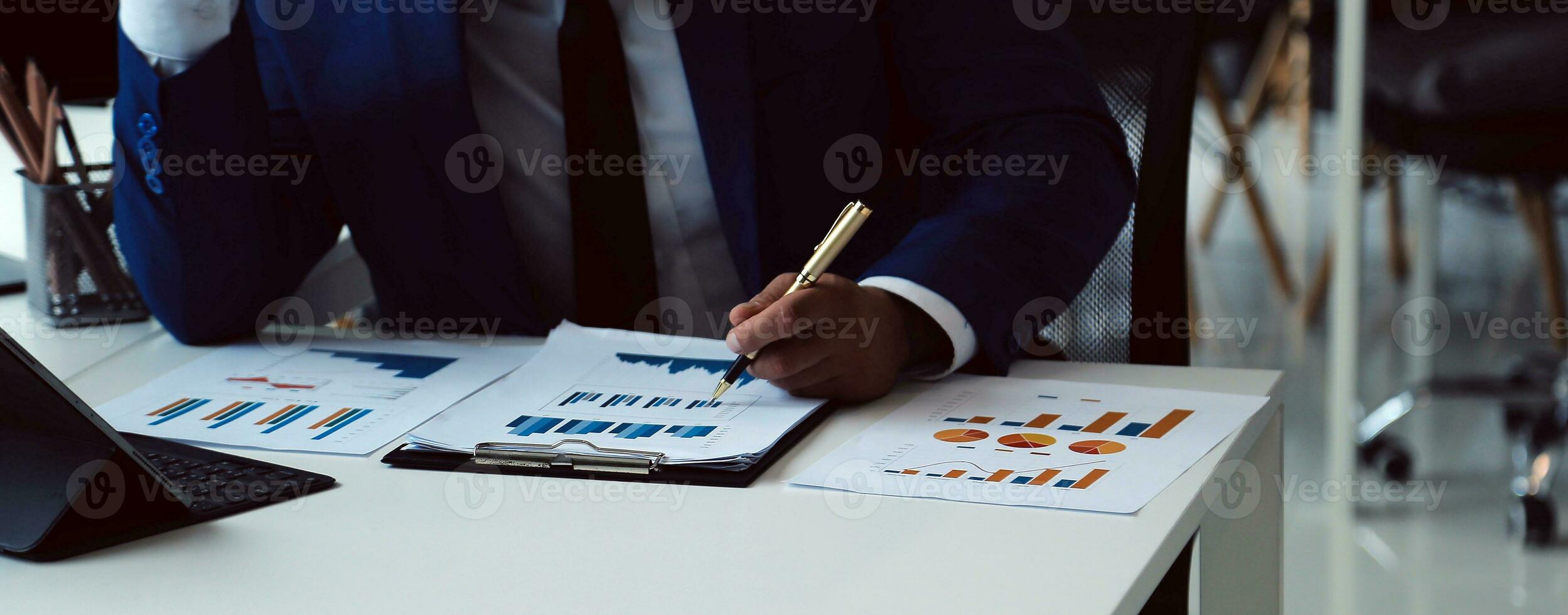 Team of business people working together in the meeting room office, teamwork background charts and graphs banner, double exposure successful teamwork,business planning concept. photo