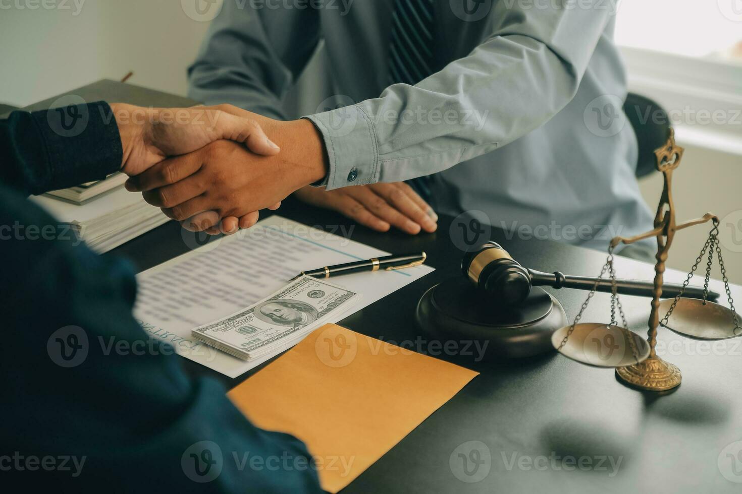 Lawyer, legal advisor, businessman brainstorming information on agreement details Business contracts in legal processing books for accuracy in contract documents. joint financial investment. photo