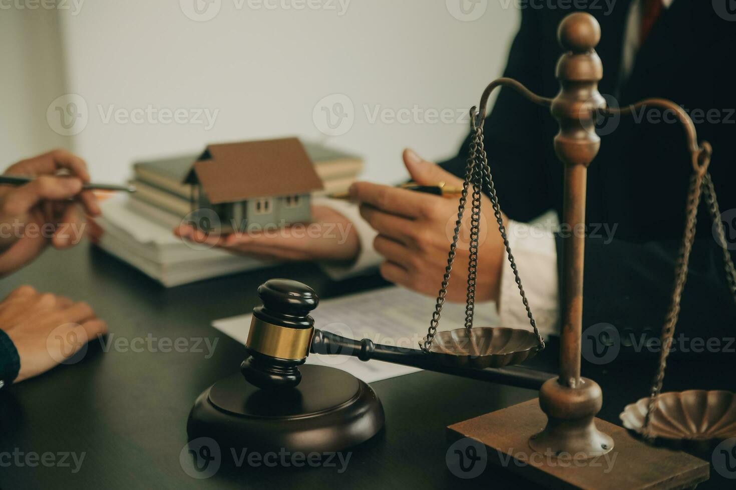 Lawyer, legal advisor, businessman brainstorming information on agreement details Business contracts in legal processing books for accuracy in contract documents. joint financial investment. photo