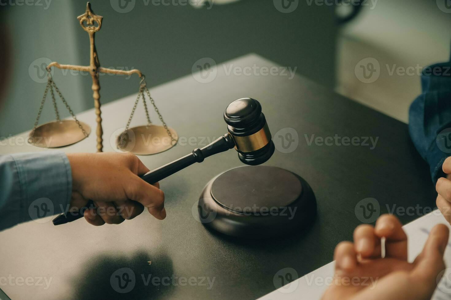 Lawyer, legal advisor, businessman brainstorming information on agreement details Business contracts in legal processing books for accuracy in contract documents. joint financial investment. photo