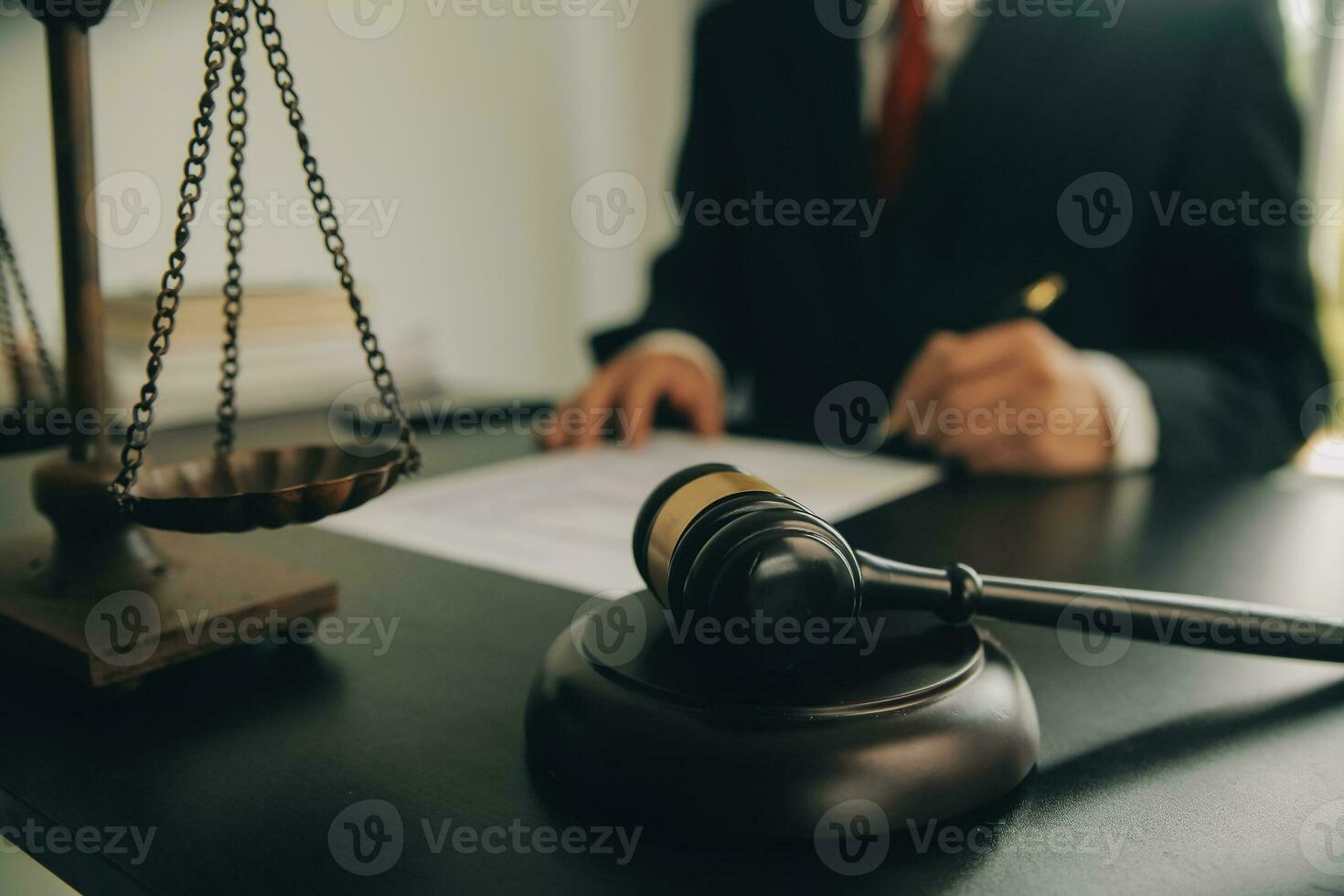 Lawyer, legal advisor, businessman brainstorming information on agreement details Business contracts in legal processing books for accuracy in contract documents. joint financial investment. photo