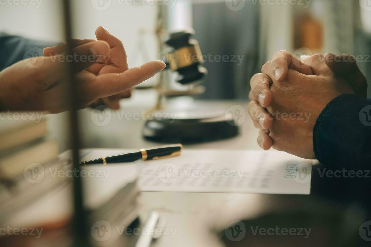 Lawyer, legal advisor, businessman brainstorming information on agreement details Business contracts in legal processing books for accuracy in contract documents. joint financial investment. photo