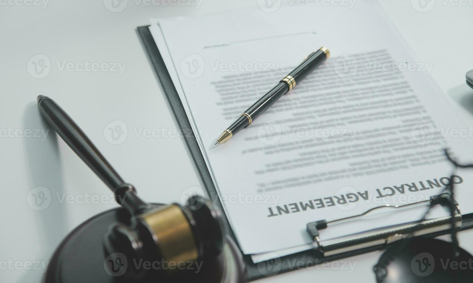 Business and lawyers discussing contract papers with brass scale on desk in office. Law, legal services, advice, justice and law concept picture with film grain effect photo