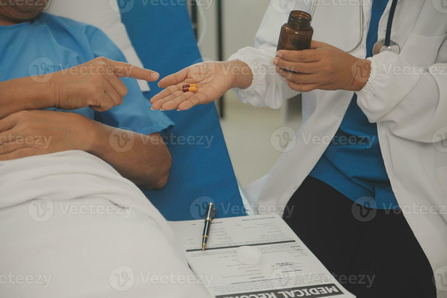 Close up of Female Doctor using stethoscope putting beat heart diagnose with patient in examination room at a hospital, check-up body, Medical and Health Care Concept. photo