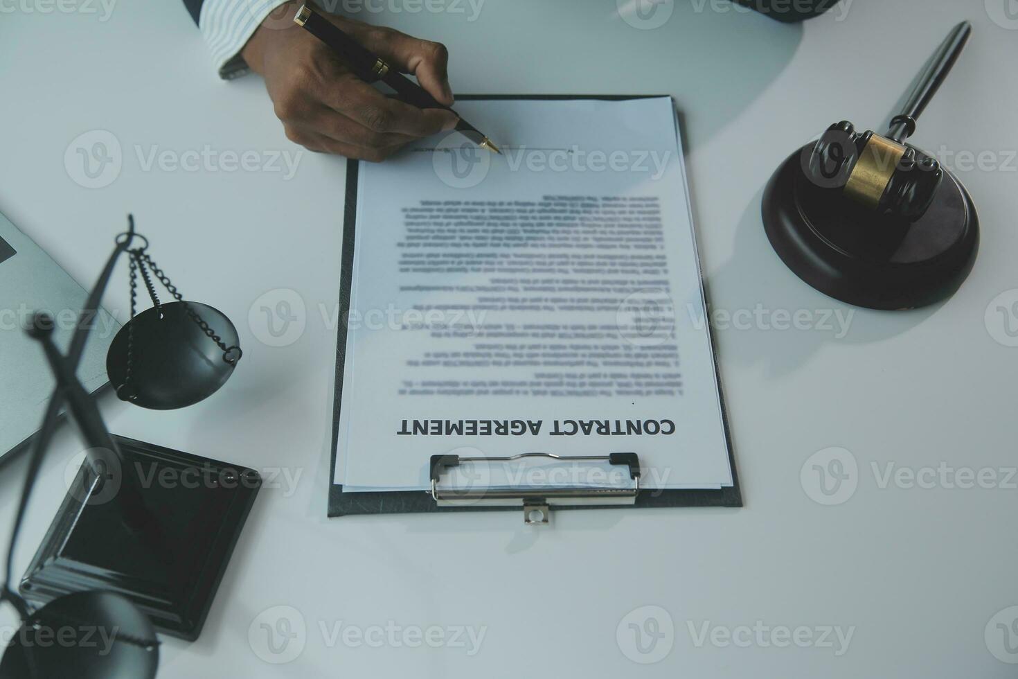 Business and lawyers discussing contract papers with brass scale on desk in office. Law, legal services, advice, justice and law concept picture with film grain effect photo