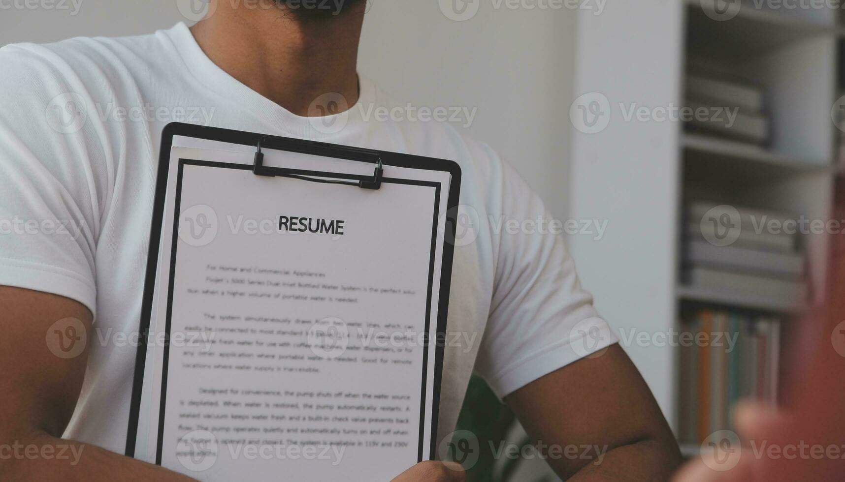 Close up view of job interview in office, focus on resume writing tips, employer reviewing good cv of prepared skilled applicant, recruiter considering application, hr manager making hiring decision photo