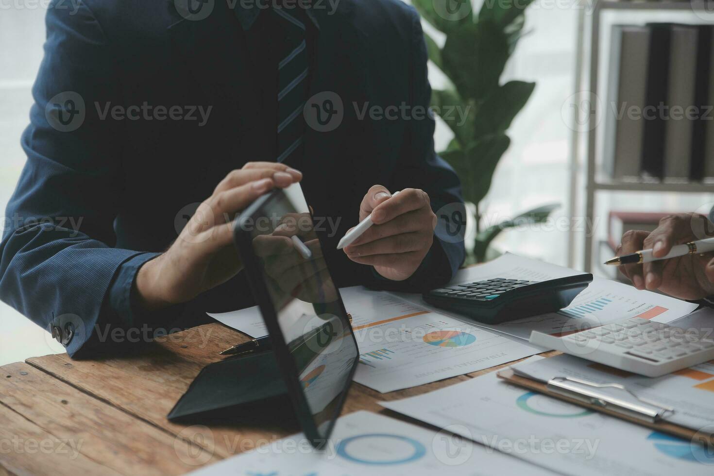 Team of business people working together in the meeting room office, teamwork background charts and graphs banner, double exposure successful teamwork,business planning concept. photo