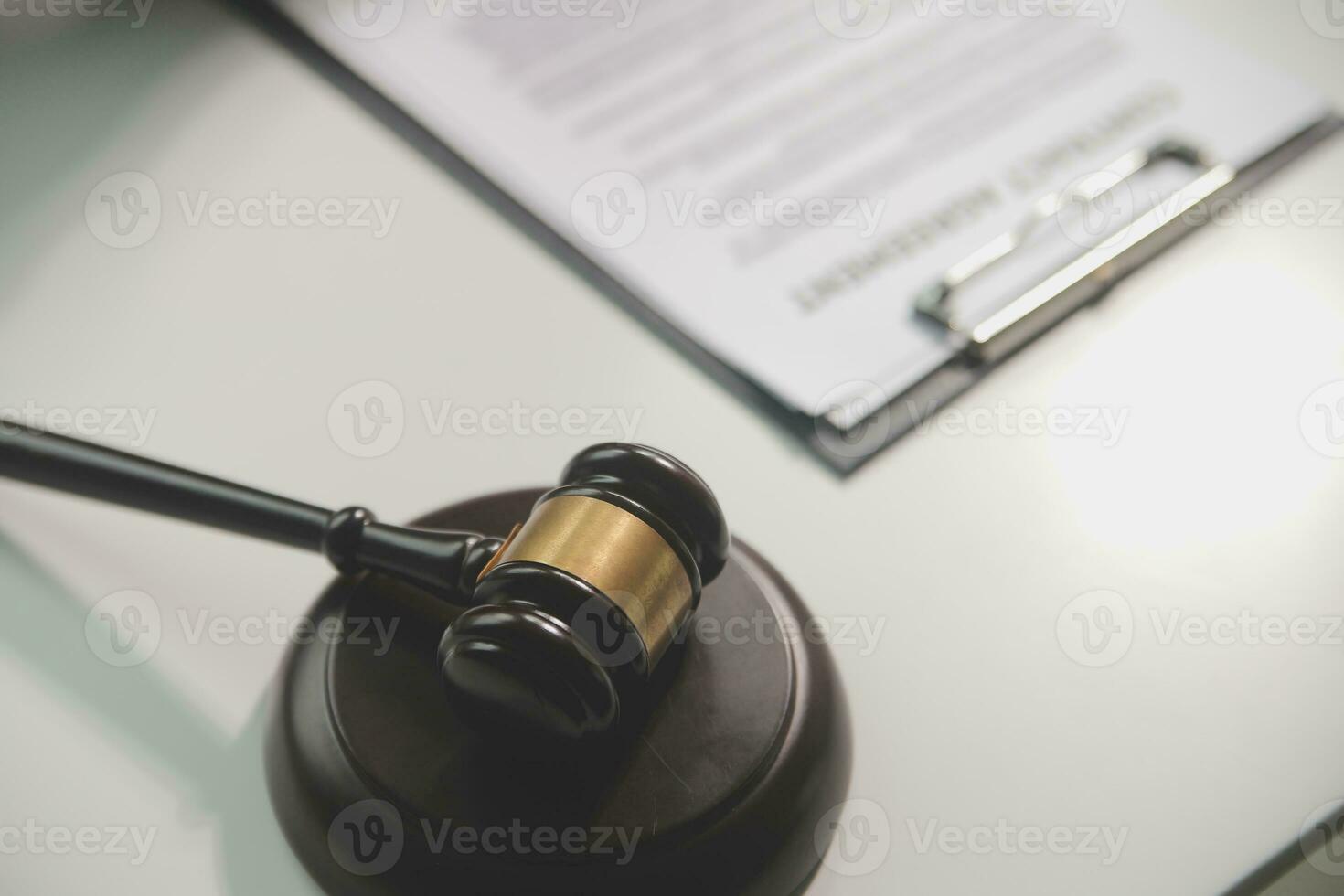 Business and lawyers discussing contract papers with brass scale on desk in office. Law, legal services, advice, justice and law concept picture with film grain effect photo