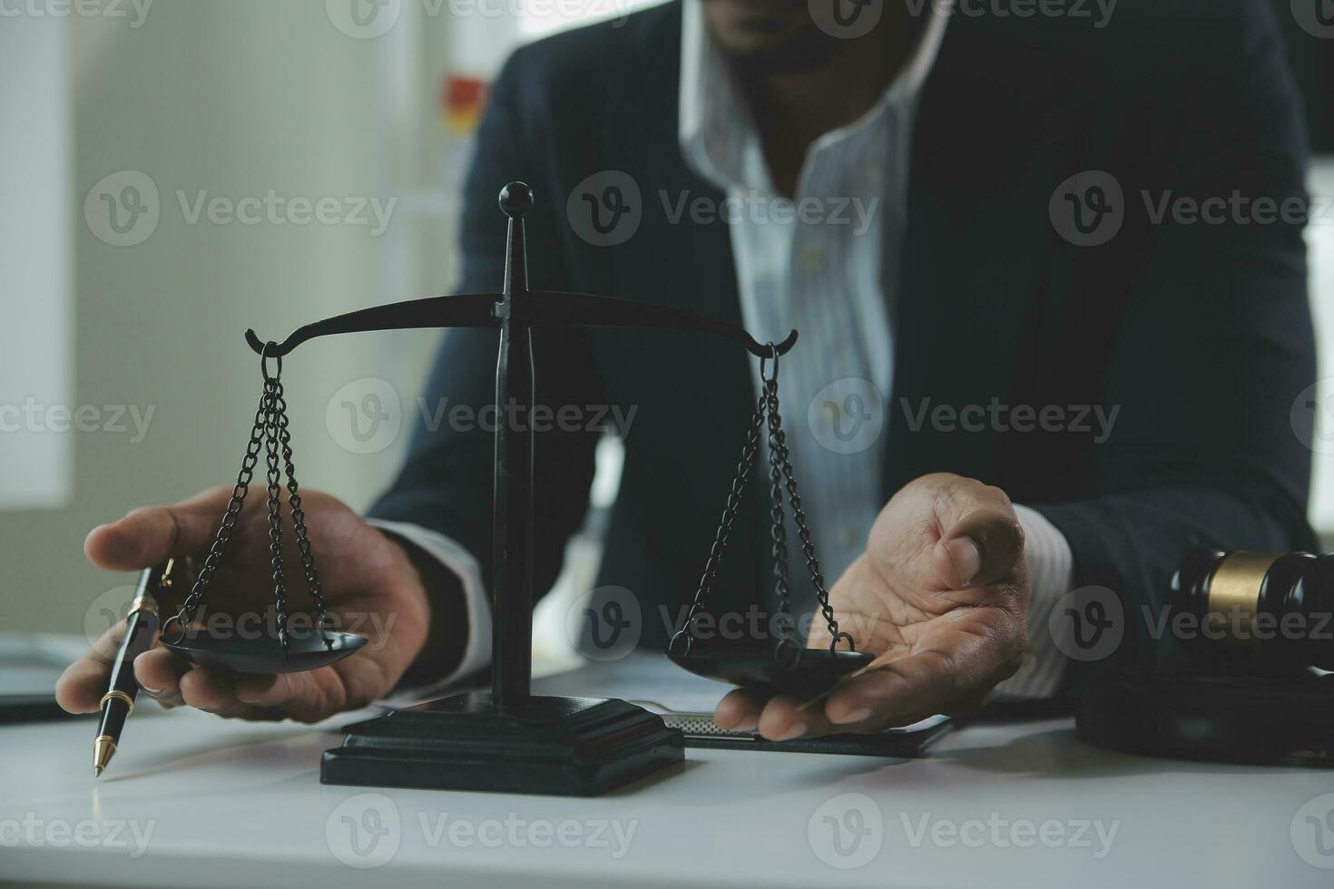 Business and lawyers discussing contract papers with brass scale on desk in office. Law, legal services, advice, justice and law concept picture with film grain effect photo
