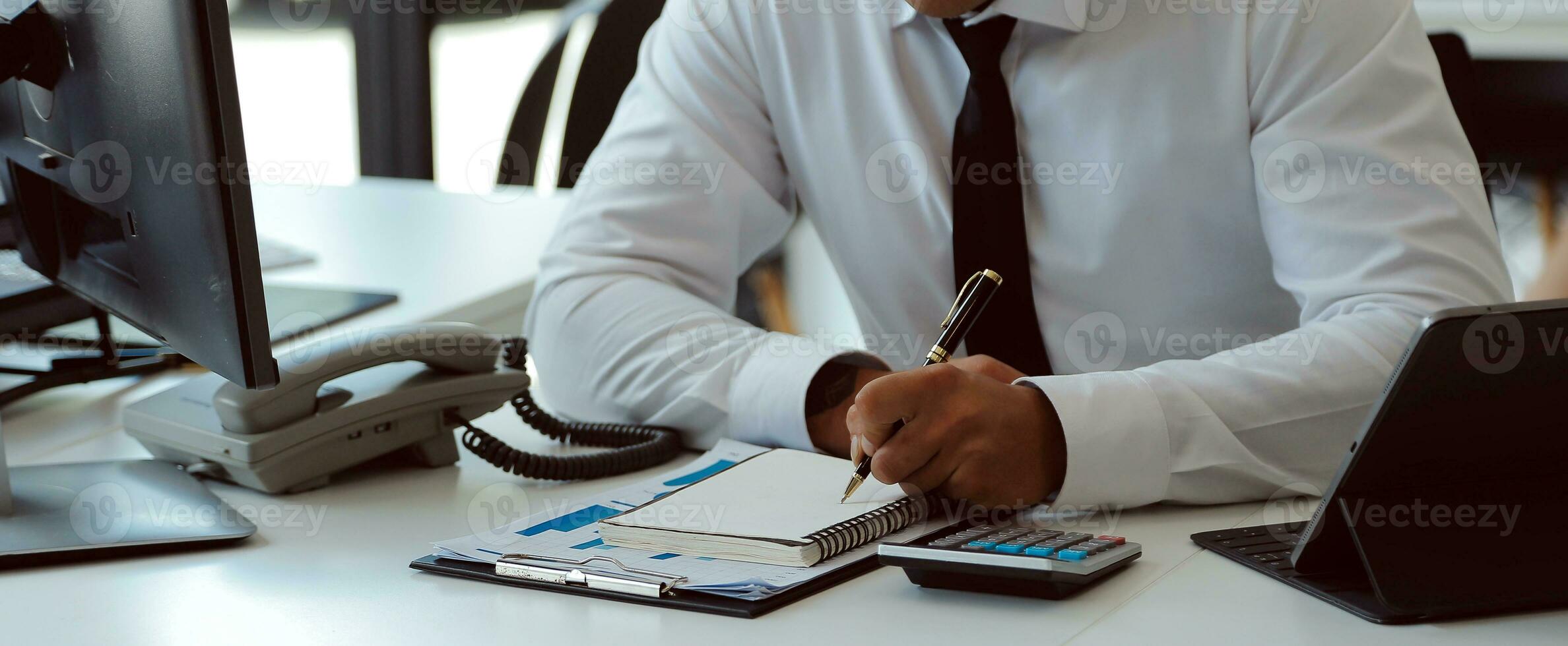 Close up of Business team analyzing income charts and graphs with modern laptop computer. Business analysis and strategy concept. photo