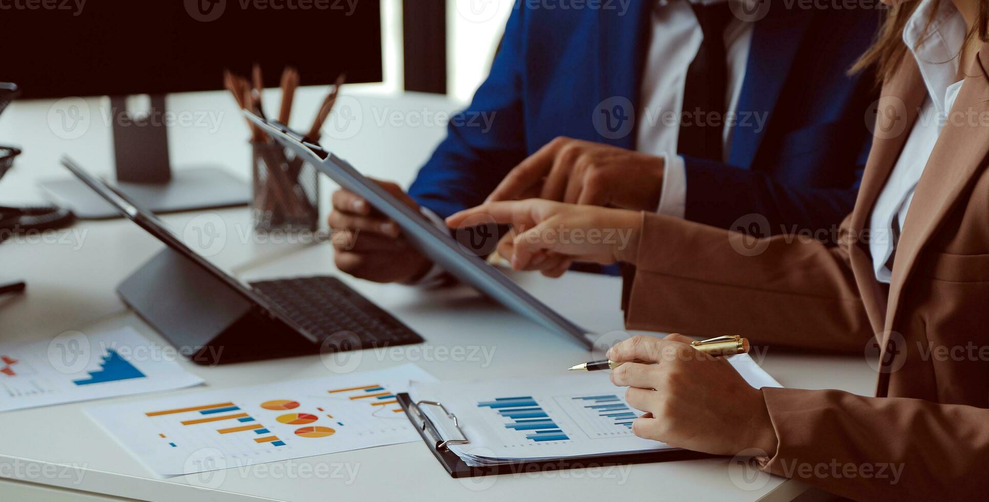 Team of business people working together in the meeting room office, teamwork background charts and graphs banner, double exposure successful teamwork,business planning concept. photo