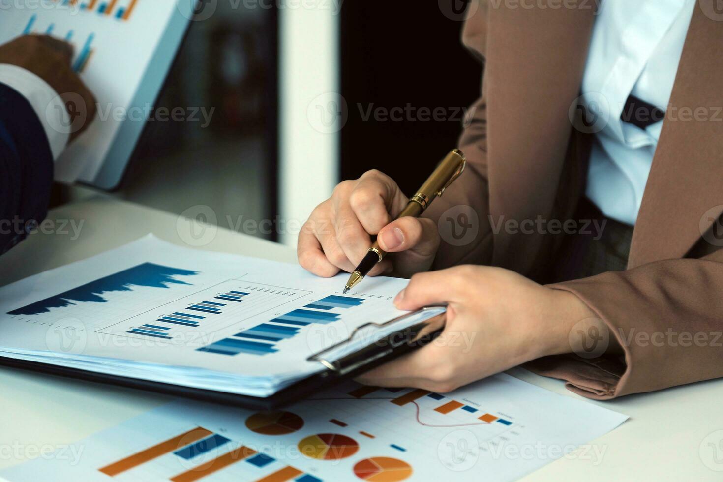 Team of business people working together in the meeting room office, teamwork background charts and graphs banner, double exposure successful teamwork,business planning concept. photo