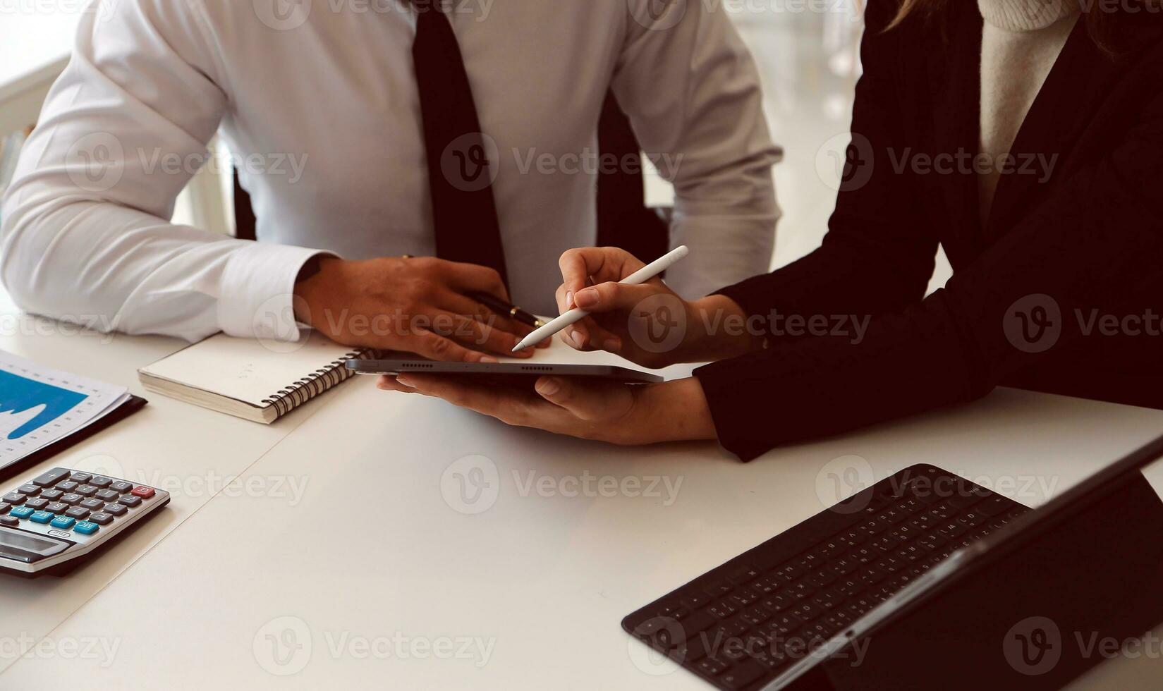 Close up of Business team analyzing income charts and graphs with modern laptop computer. Business analysis and strategy concept. photo