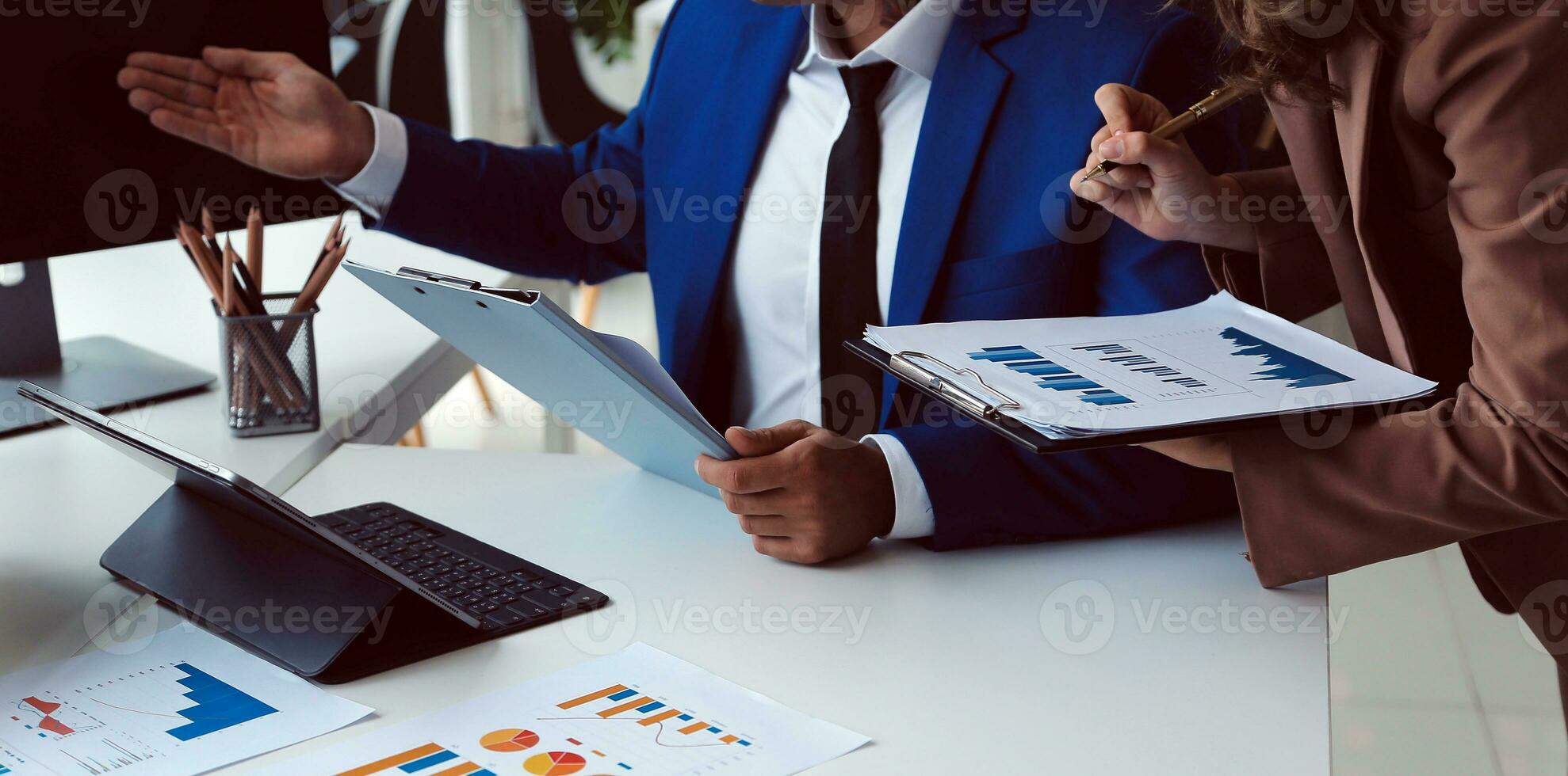 Team of business people working together in the meeting room office, teamwork background charts and graphs banner, double exposure successful teamwork,business planning concept. photo