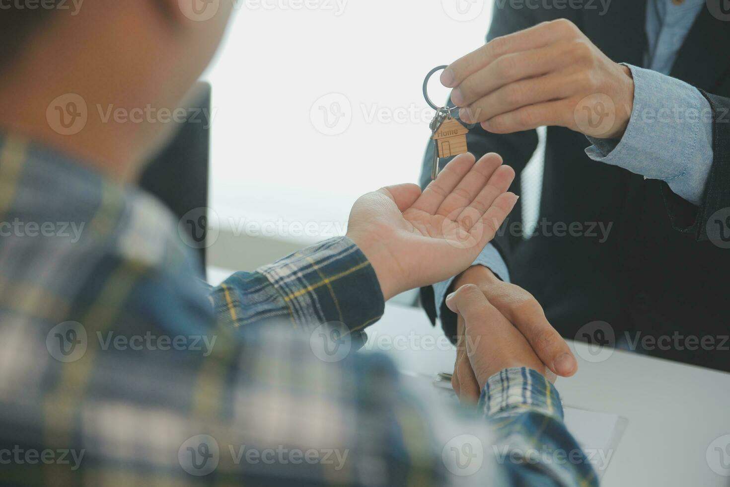 Real estate agent and customer signing contract to buy house, insurance or loan real estate.rent a house,get insurance or loan real estate or property. photo