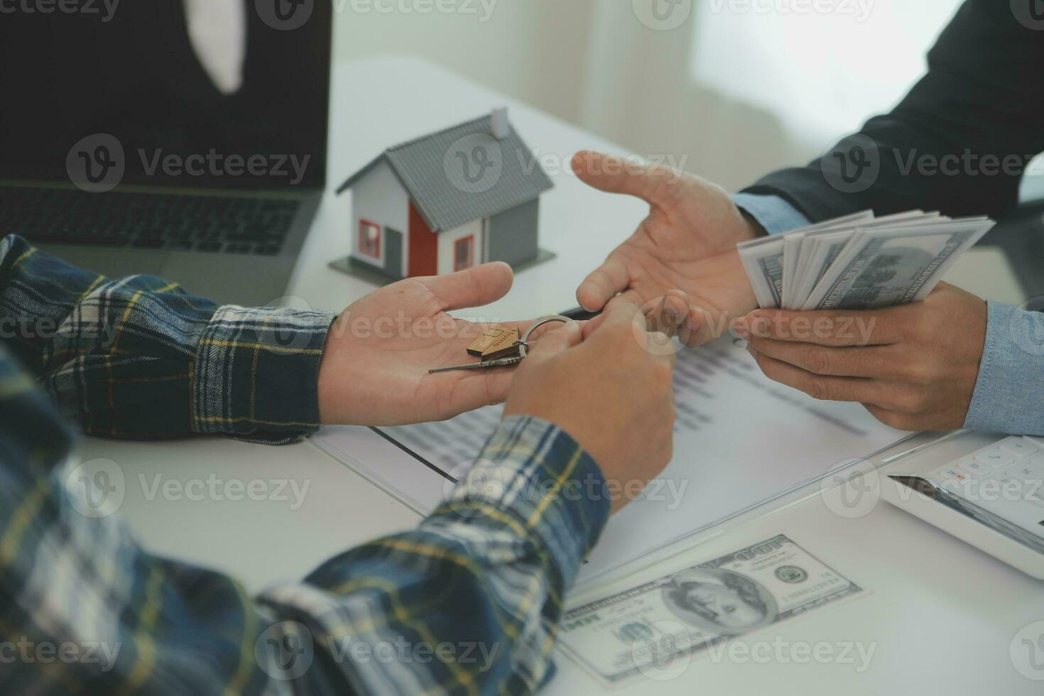 Real estate agent and customer signing contract to buy house, insurance or loan real estate.rent a house,get insurance or loan real estate or property. photo