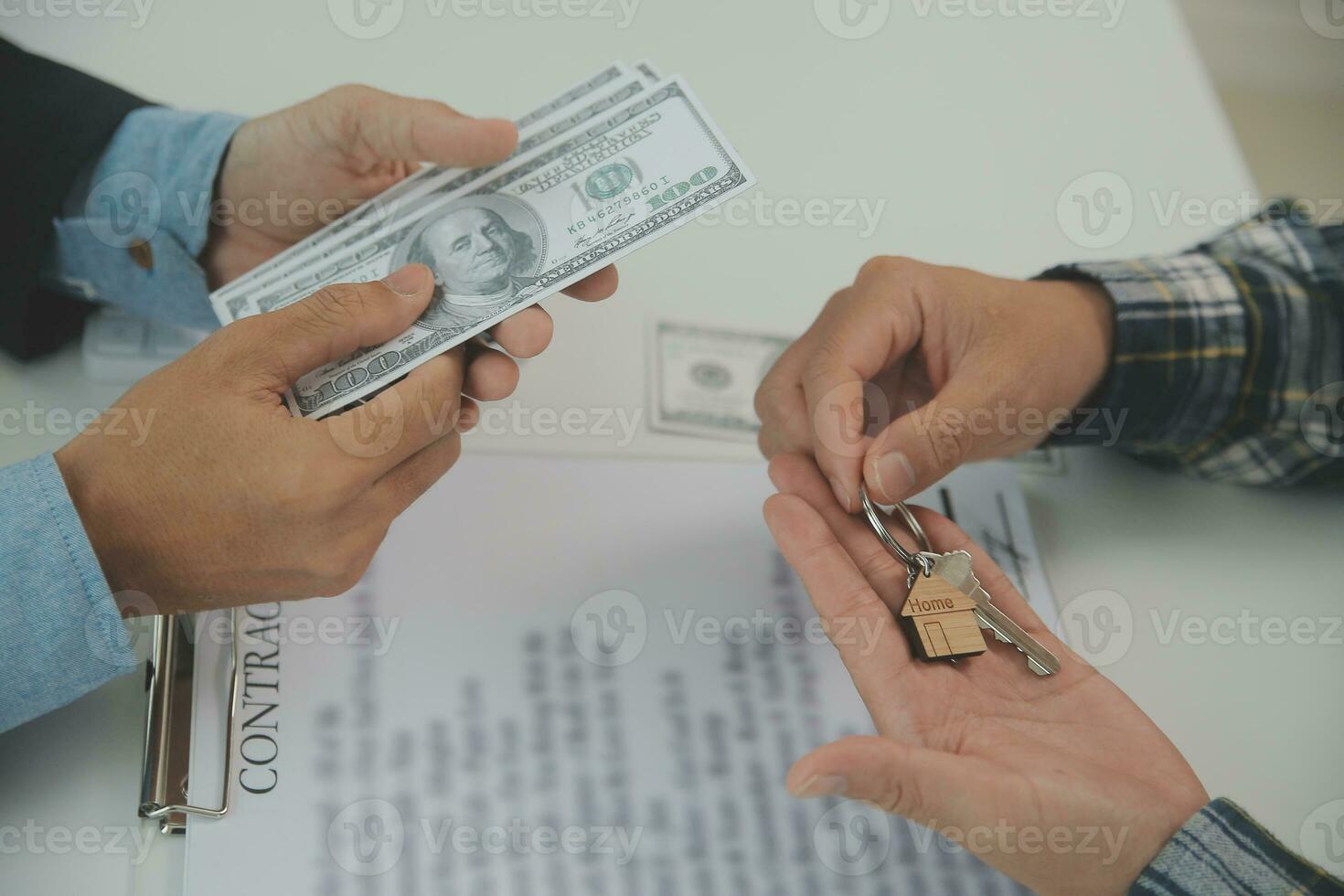 Real estate agent and customer signing contract to buy house, insurance or loan real estate.rent a house,get insurance or loan real estate or property. photo