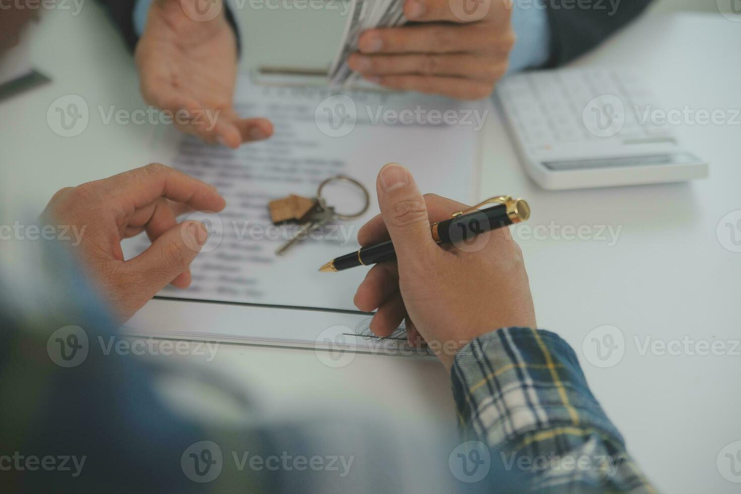 Real estate agent and customer signing contract to buy house, insurance or loan real estate.rent a house,get insurance or loan real estate or property. photo