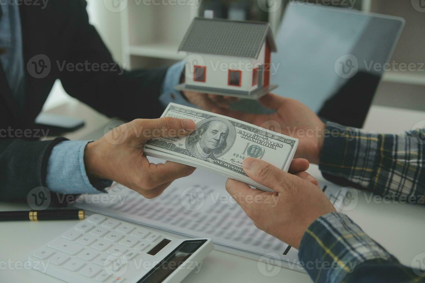Real estate agent and customer signing contract to buy house, insurance or loan real estate.rent a house,get insurance or loan real estate or property. photo