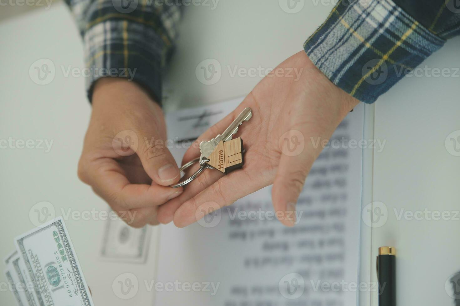 Real estate agent and customer signing contract to buy house, insurance or loan real estate.rent a house,get insurance or loan real estate or property. photo