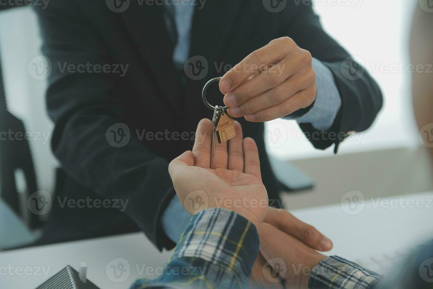 Real estate agent and customer signing contract to buy house, insurance or loan real estate.rent a house,get insurance or loan real estate or property. photo