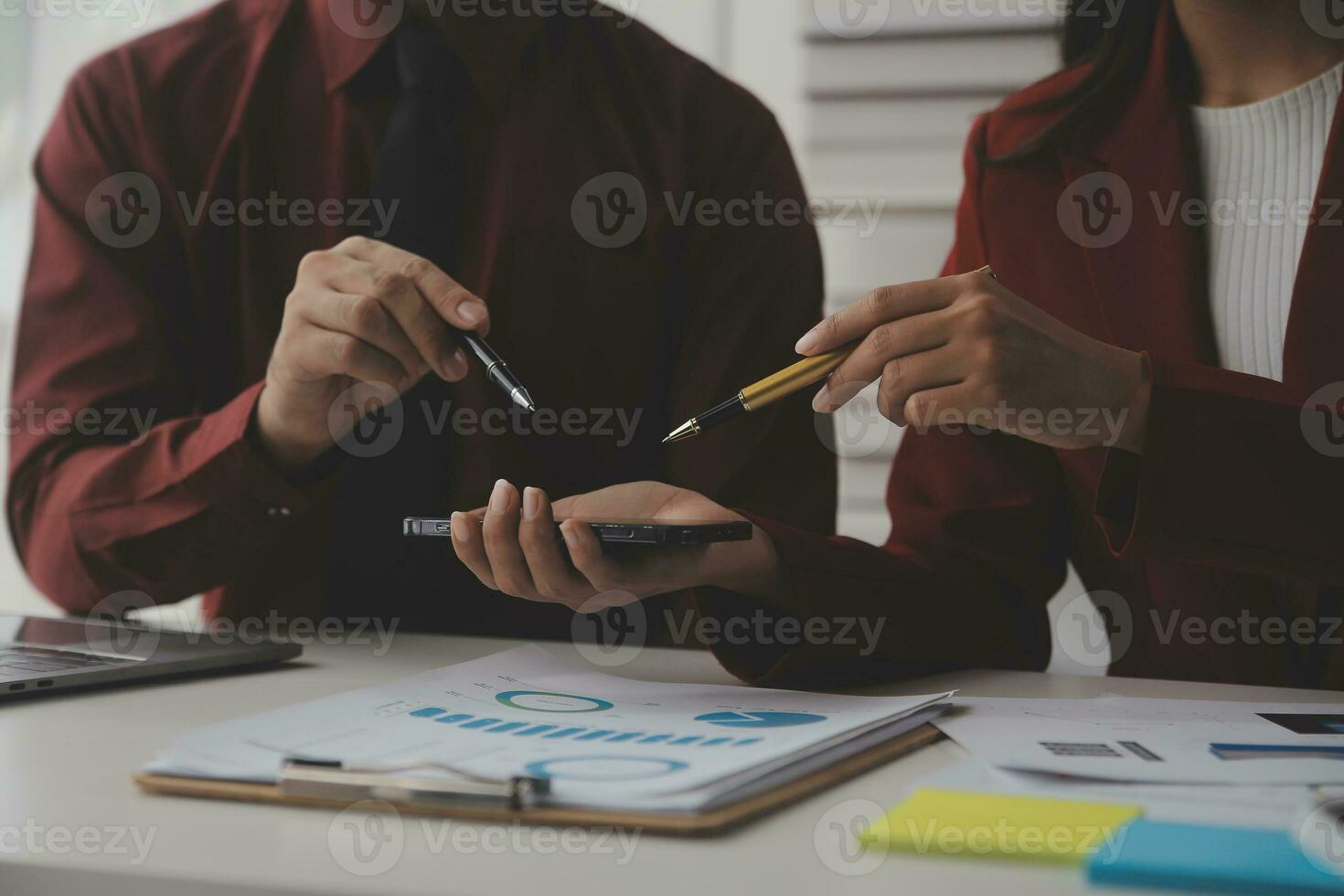 Close up Business woman using calculator and laptop for do math finance on wooden desk, tax, accounting, statistics and analytical research concept photo