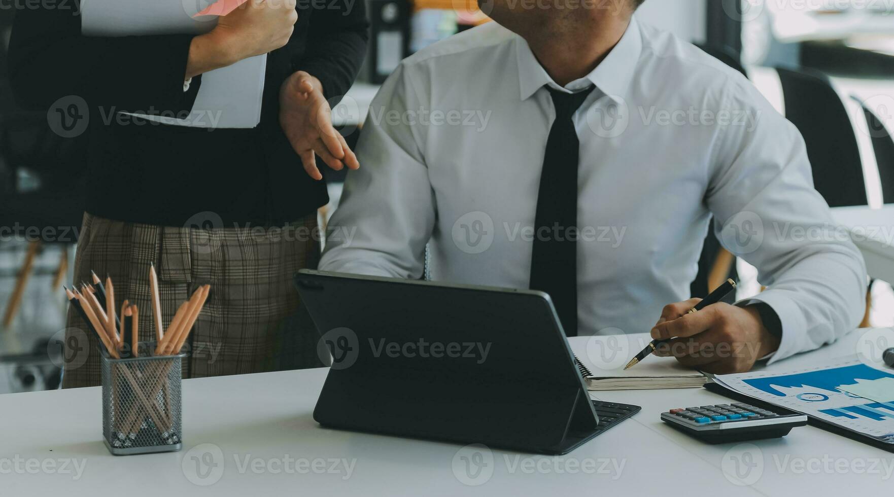 Close up of Business team analyzing income charts and graphs with modern laptop computer. Business analysis and strategy concept. photo