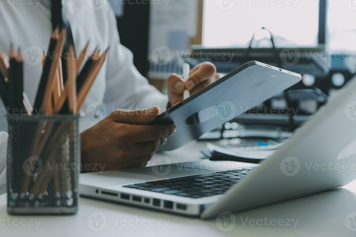 Close up of Business team analyzing income charts and graphs with modern laptop computer. Business analysis and strategy concept. photo