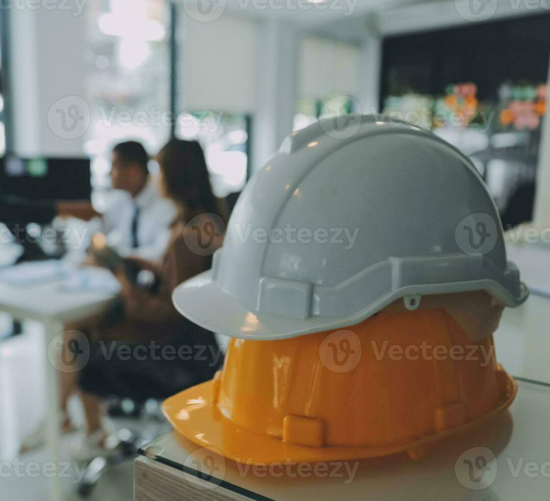 Construction and structure concept of Engineer or architect meeting for project working with partner and engineering tools on model building and blueprint in working site, contract for both companies. photo