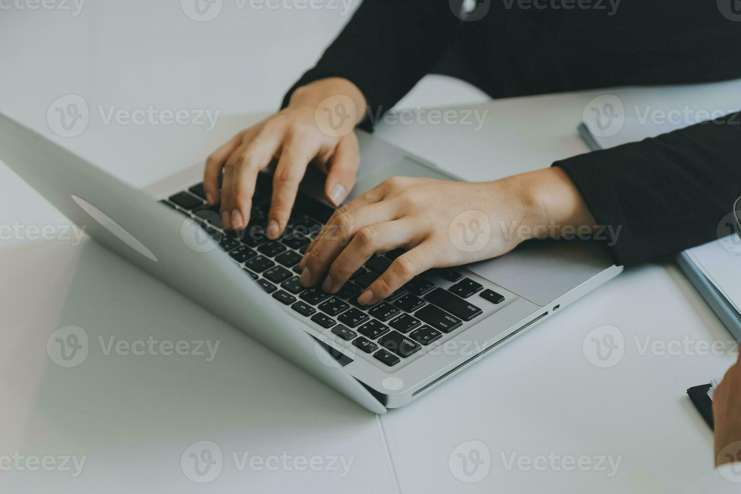Close up of Business team analyzing income charts and graphs with modern laptop computer. Business analysis and strategy concept. photo