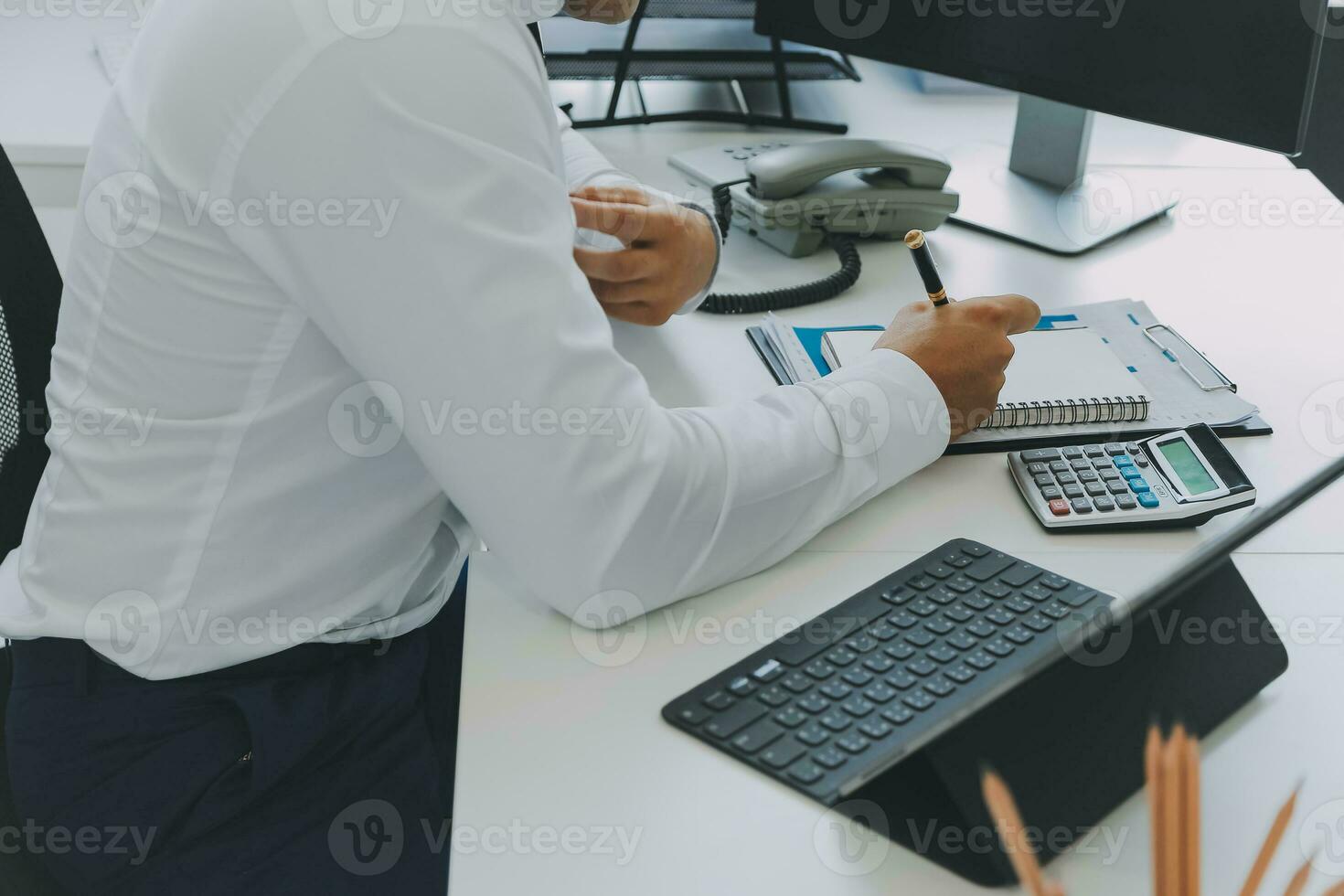 Close up of Business team analyzing income charts and graphs with modern laptop computer. Business analysis and strategy concept. photo
