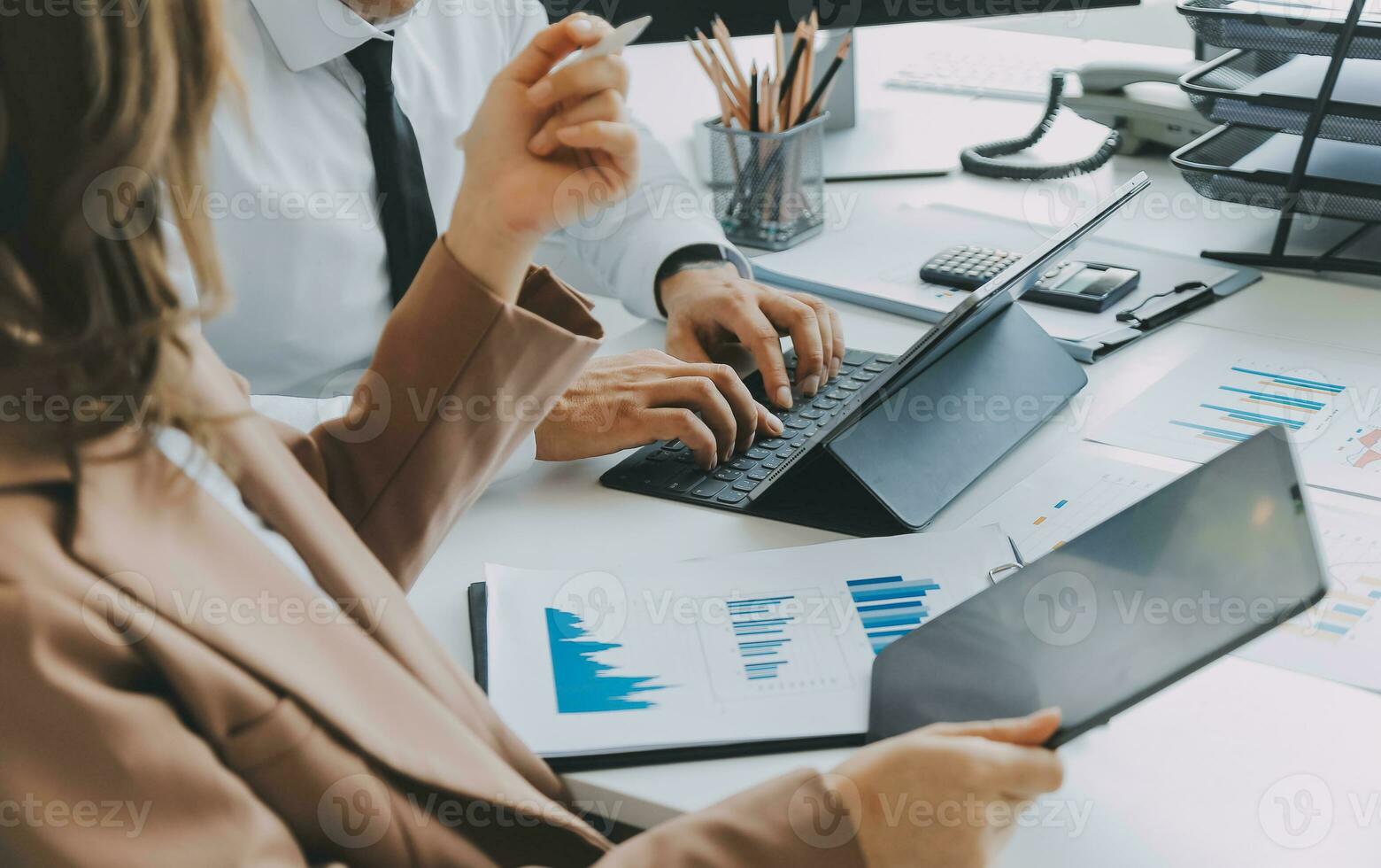 Team of business people working together in the meeting room office, teamwork background charts and graphs banner, double exposure successful teamwork,business planning concept. photo