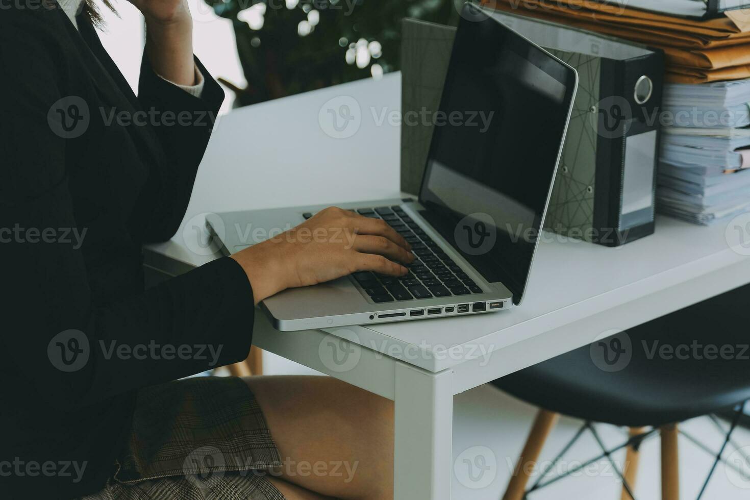 Close up of Business team analyzing income charts and graphs with modern laptop computer. Business analysis and strategy concept. photo