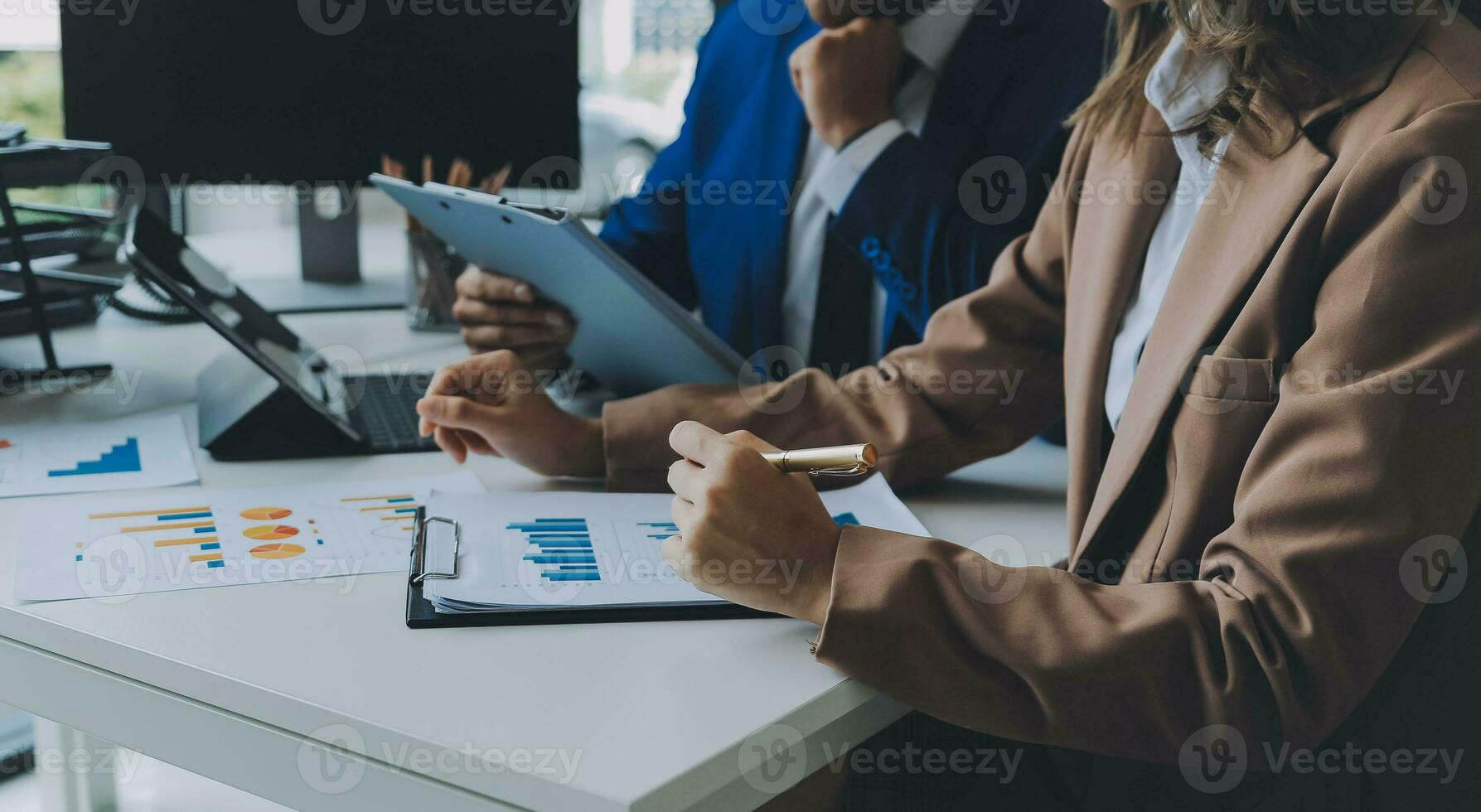 Team of business people working together in the meeting room office, teamwork background charts and graphs banner, double exposure successful teamwork,business planning concept. photo