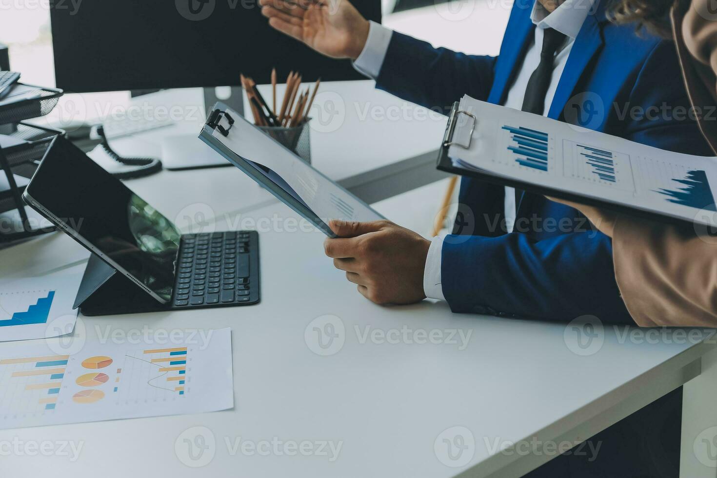Team of business people working together in the meeting room office, teamwork background charts and graphs banner, double exposure successful teamwork,business planning concept. photo