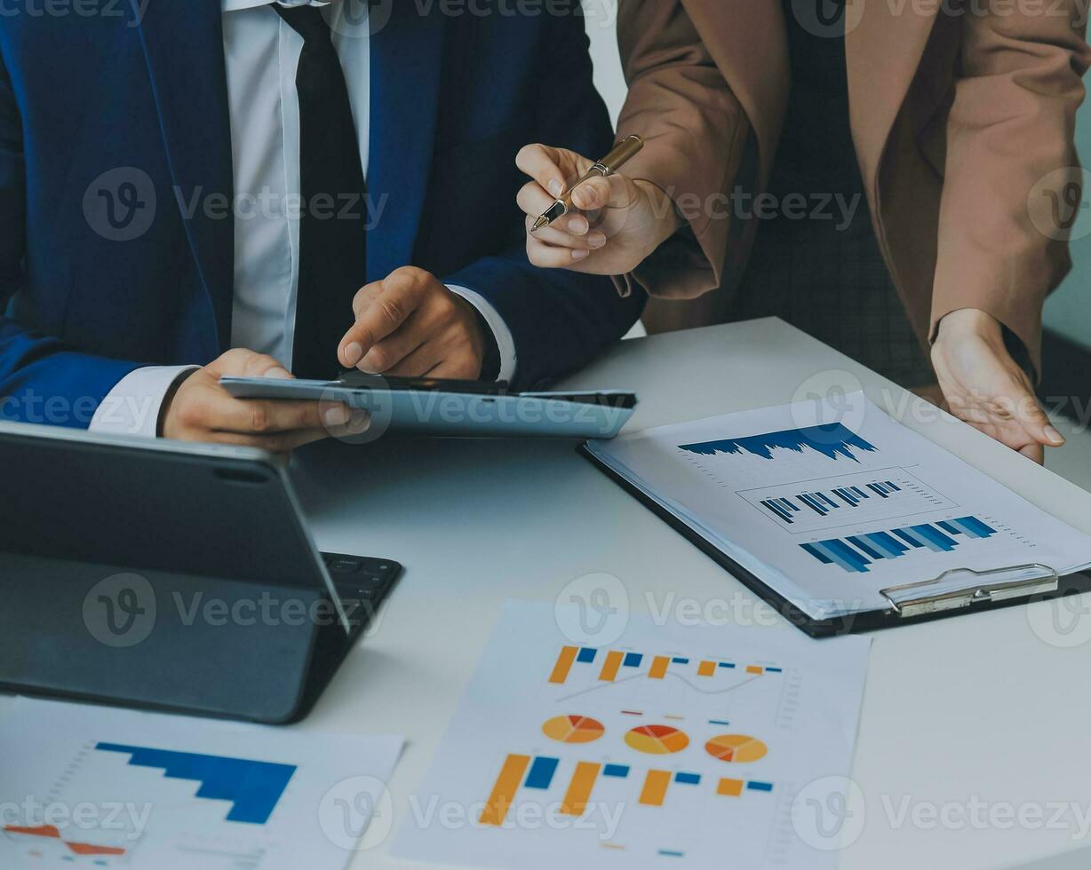 Team of business people working together in the meeting room office, teamwork background charts and graphs banner, double exposure successful teamwork,business planning concept. photo