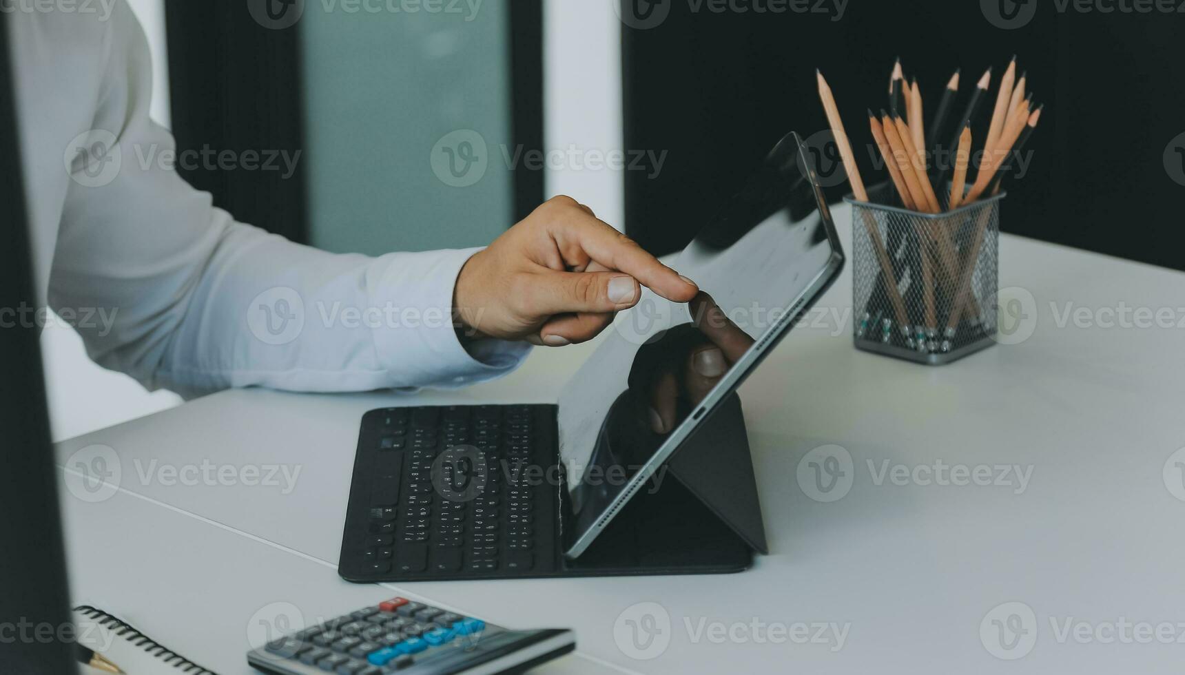 Close up of Business team analyzing income charts and graphs with modern laptop computer. Business analysis and strategy concept. photo