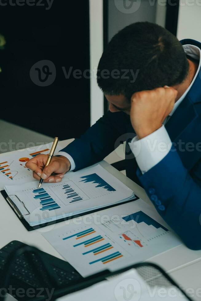 Team of business people working together in the meeting room office, teamwork background charts and graphs banner, double exposure successful teamwork,business planning concept. photo