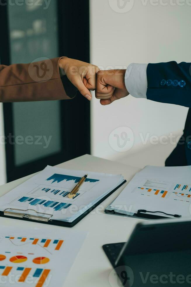 Team of business people working together in the meeting room office, teamwork background charts and graphs banner, double exposure successful teamwork,business planning concept. photo