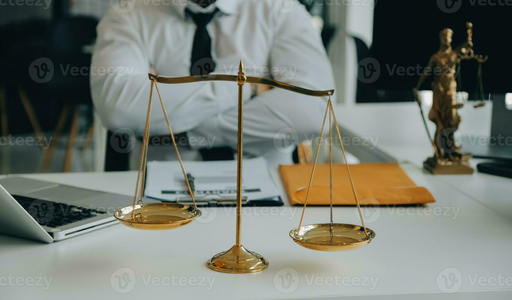 Judge gavel with Justice lawyers having team meeting at law firm in background. Concepts of law. photo