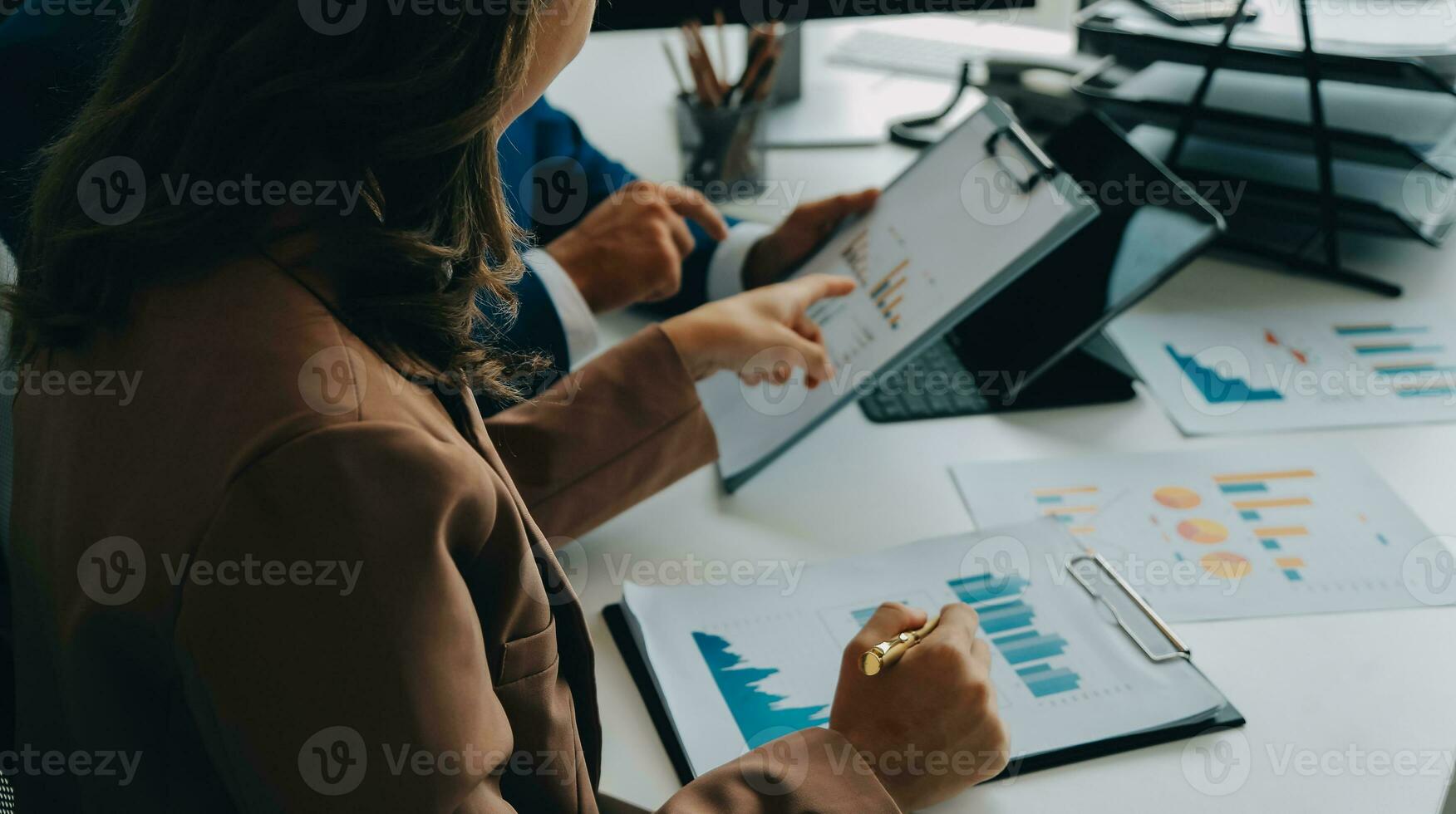 Team of business people working together in the meeting room office, teamwork background charts and graphs banner, double exposure successful teamwork,business planning concept. photo